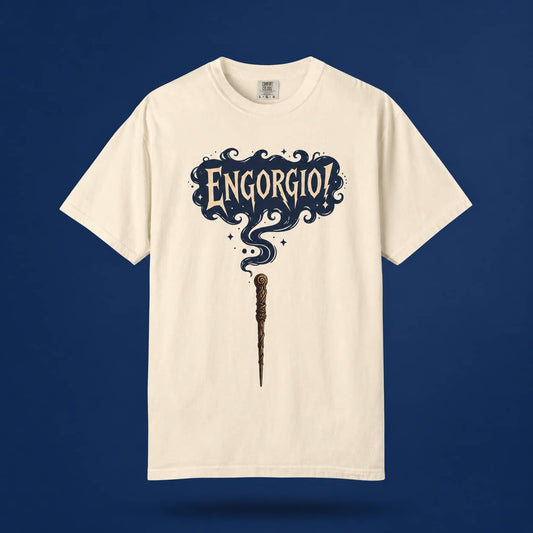 Engorgio magic wand graphic tee in cream, displayed front-facing against a contrasting dark blue background.