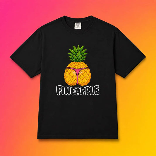 Flat lay of a black Fineapple thong t-shirt displayed against a bright pink and yellow tropical gradient background.