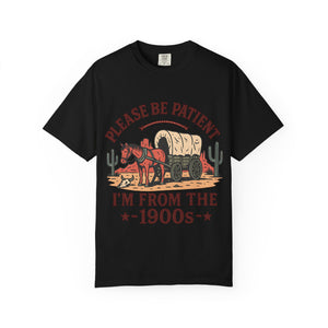 Flat lay of the Please Be Patient I'm From The 1900s graphic tee in Black.