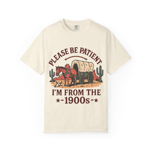 Flat lay of the Please Be Patient I'm From The 1900s t-shirt in cream.