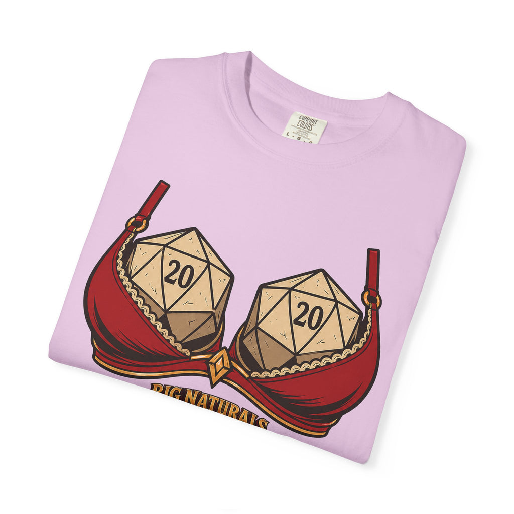 Folded pink t-shirt with dice design and 'Big Naturals' text on a white background