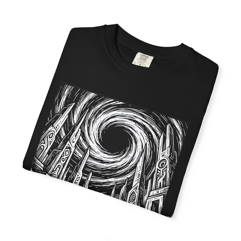 Folded black t-shirt close-up highlighting the intricate black and white black hole astronaut design with ancient ruins and swirling vortex.