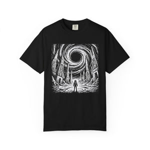 Black t-shirt featuring a bold black and white graphic of a lone astronaut standing before ancient alien ruins with a massive swirling black hole in the sky. Vintage woodcut sci-fi design on a black Comfort Colors style tee