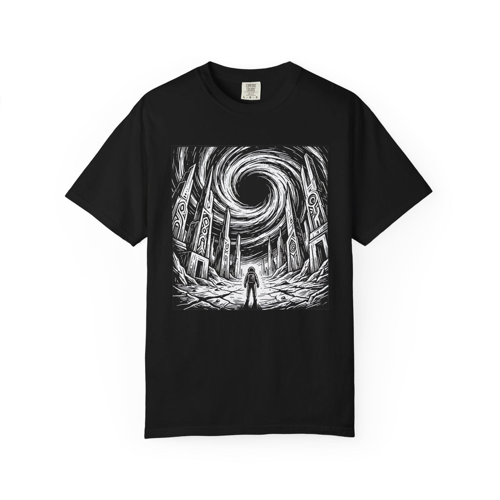 Black t-shirt featuring a bold black and white graphic of a lone astronaut standing before ancient alien ruins with a massive swirling black hole in the sky. Vintage woodcut sci-fi design on a black Comfort Colors style tee