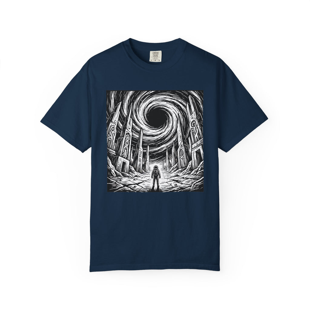 Navy blue t-shirt laid flat with a powerful black and white illustration of an astronaut facing alien ruins and a giant black hole.