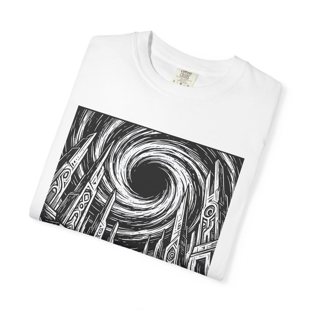 Folded white t-shirt close-up highlighting the bold black and white woodcut design of a lone astronaut facing ancient alien ruins and a massive swirling black hole.