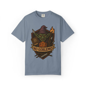 Flat lay of blue jean cotton t-shirt featuring retro fantasy goblin and D20 dice illustration