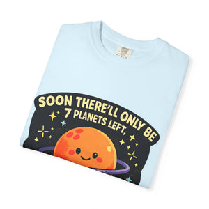 Neatly folded light blue Comfort Colors t-shirt displaying a cheeky space joke graphic.