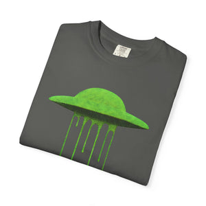 A folded grey Comfort Colors t-shirt displaying the neon green dripping UFO graphic on the front