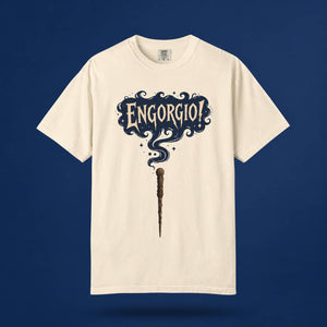 Engorgio magic wand graphic tee in cream, displayed front-facing against a contrasting dark blue background.
