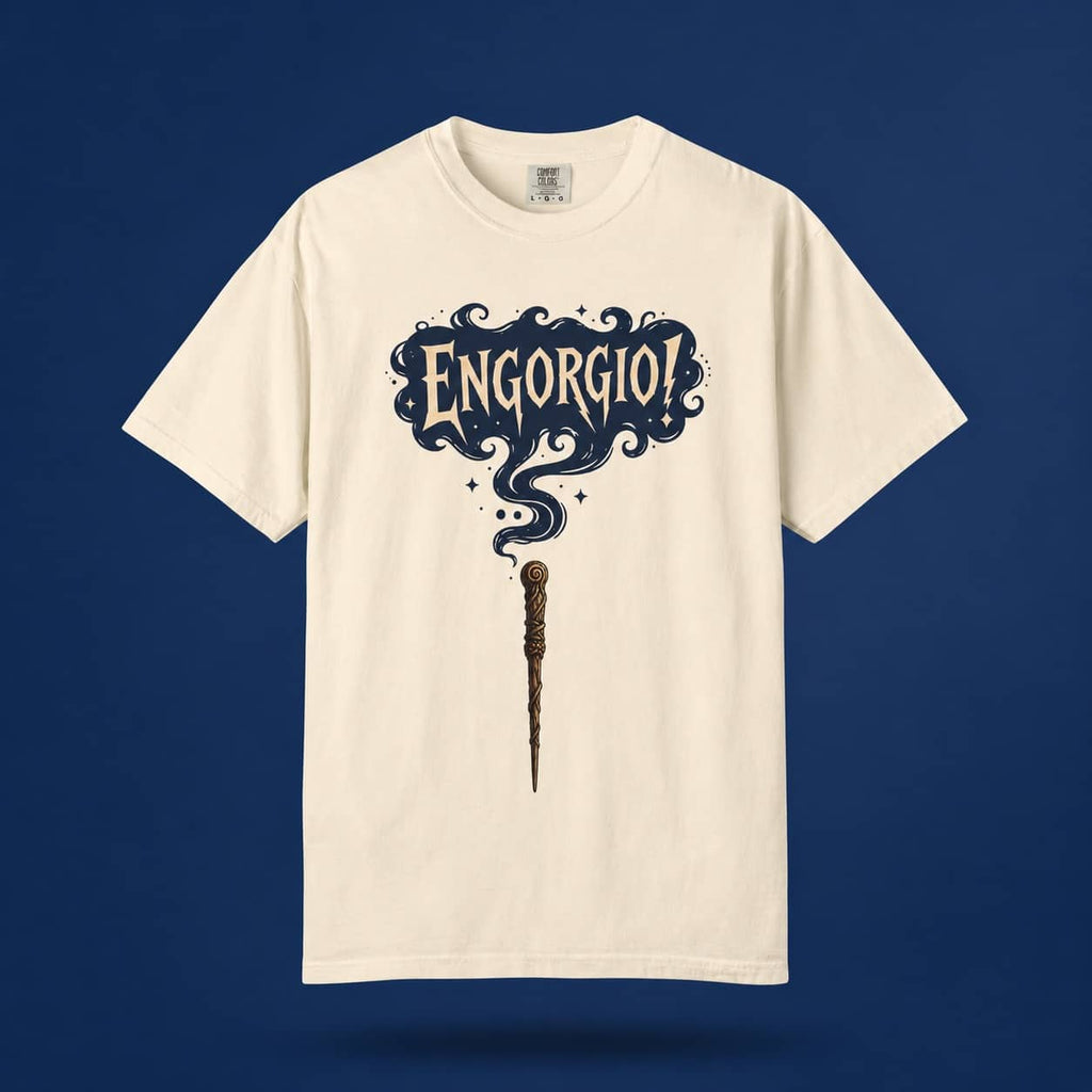 Engorgio magic wand graphic tee in cream, displayed front-facing against a contrasting dark blue background.