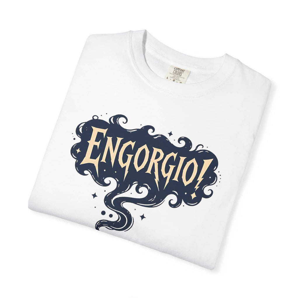 Folded white t-shirt showcasing the Engorgio magic wand and smoke graphic print.