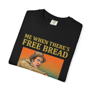 Folded black t-shirt featuring Me When There’s Free Bread design.