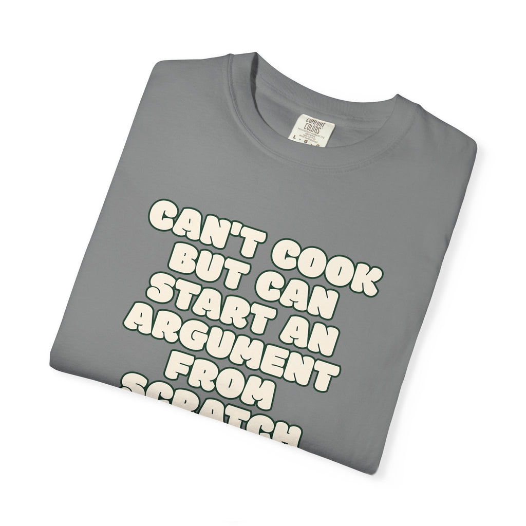 Folded grey t-shirt featuring Can’t Cook slogan.