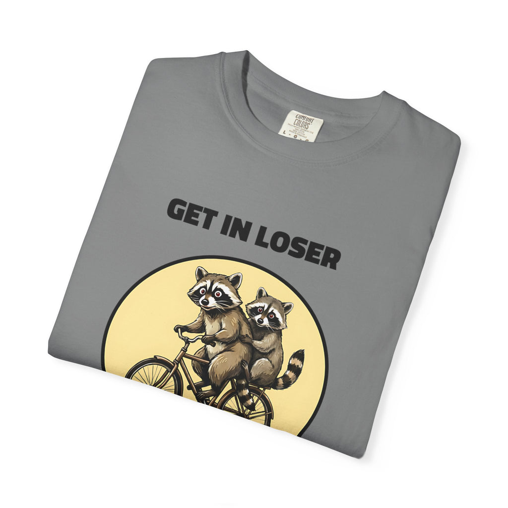 Folded grey t-shirt featuring Get In Loser We’re Getting Trashed meme design.