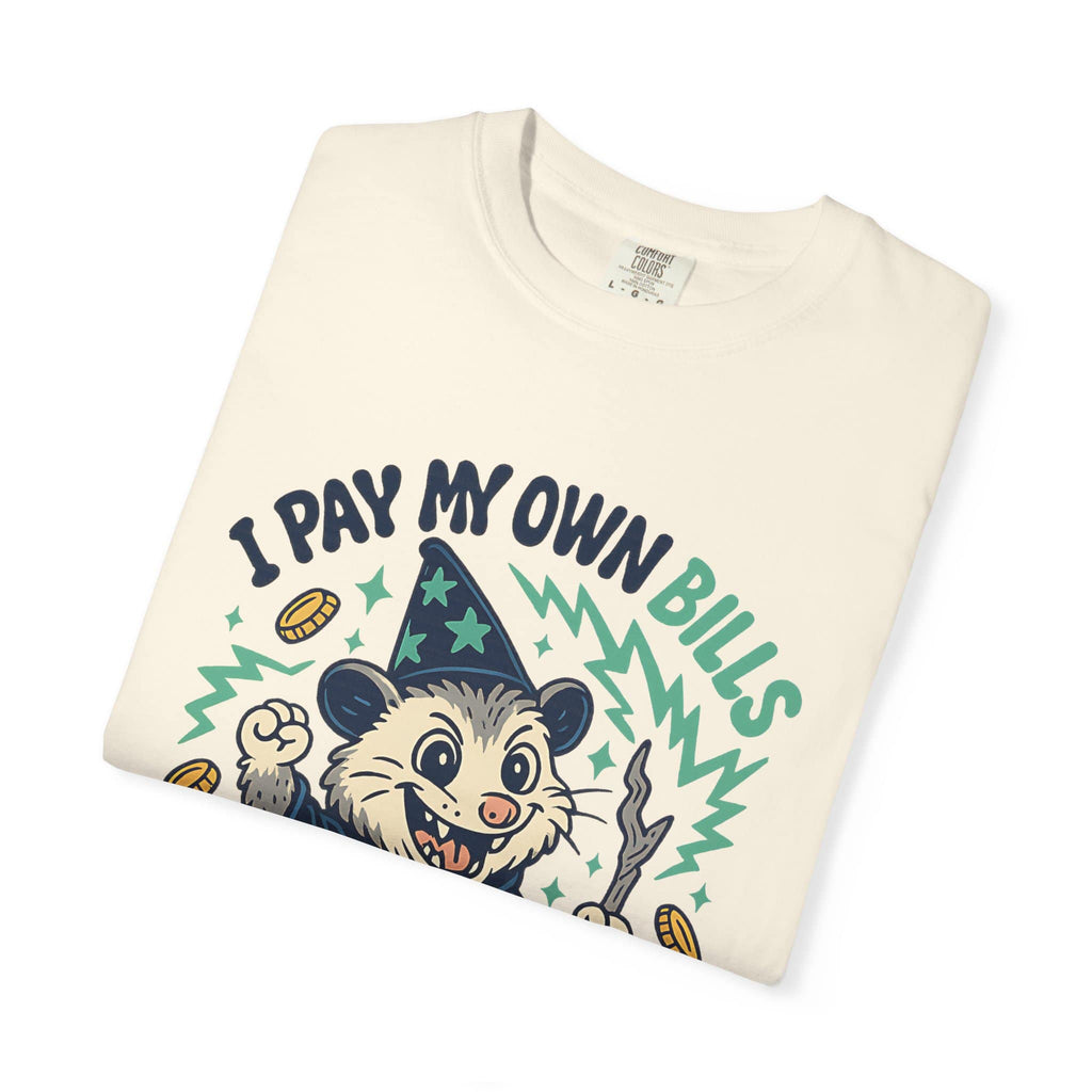 Folded cream t-shirt with retro style feral possum illustration