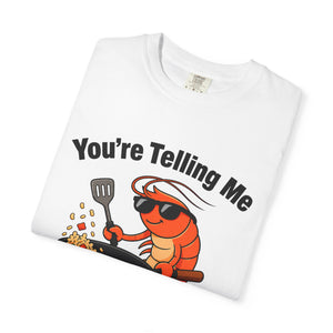 Folded white graphic t-shirt featuring shrimp fried rice design.