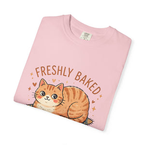 Neatly folded blossom pink Comfort Colors 1717 t-shirt displaying the Freshly Baked cat meme design centered on top.
