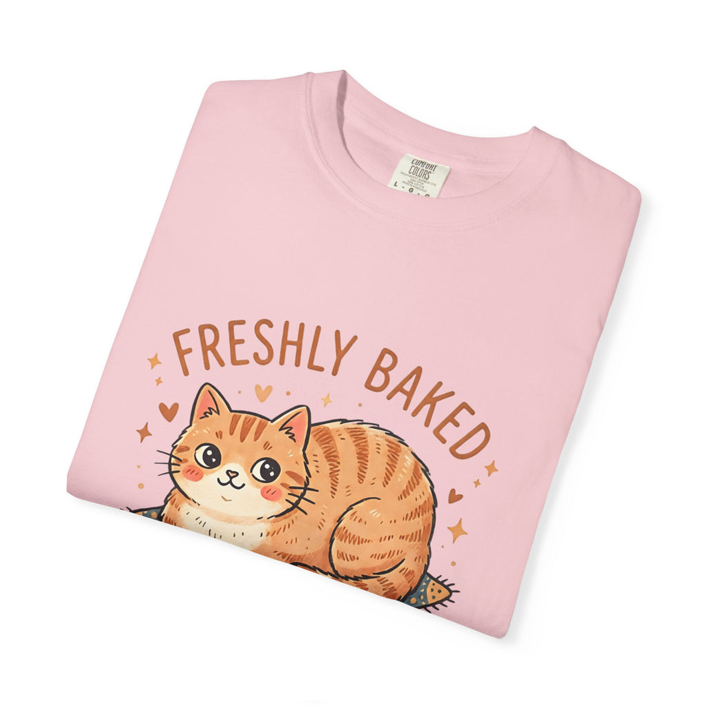 Neatly folded blossom pink Comfort Colors 1717 t-shirt displaying the Freshly Baked cat meme design centered on top.