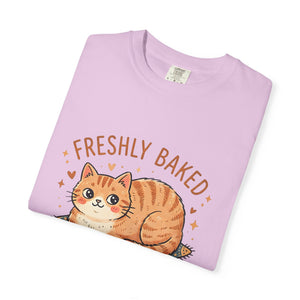 Neatly folded orchid purple Comfort Colors 1717 t-shirt showcasing the Freshly Baked cat meme graphic neatly on the fold.