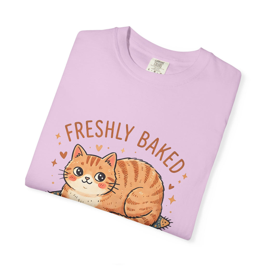 Neatly folded orchid purple Comfort Colors 1717 t-shirt showcasing the Freshly Baked cat meme graphic neatly on the fold.