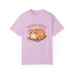 Flat-lay front view of an orchid purple Comfort Colors 1717 t-shirt showcasing the cute Freshly Baked cat graphic.