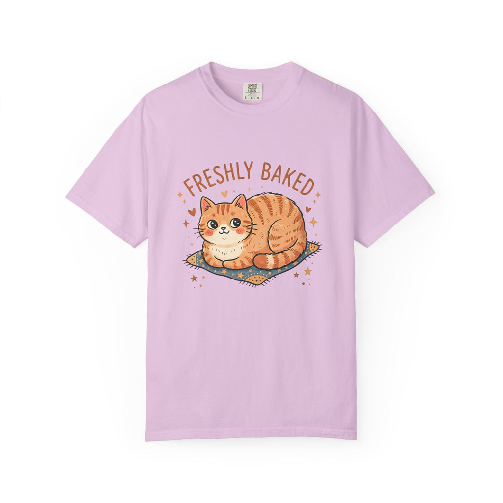 Flat-lay front view of an orchid purple Comfort Colors 1717 t-shirt showcasing the cute Freshly Baked cat graphic.