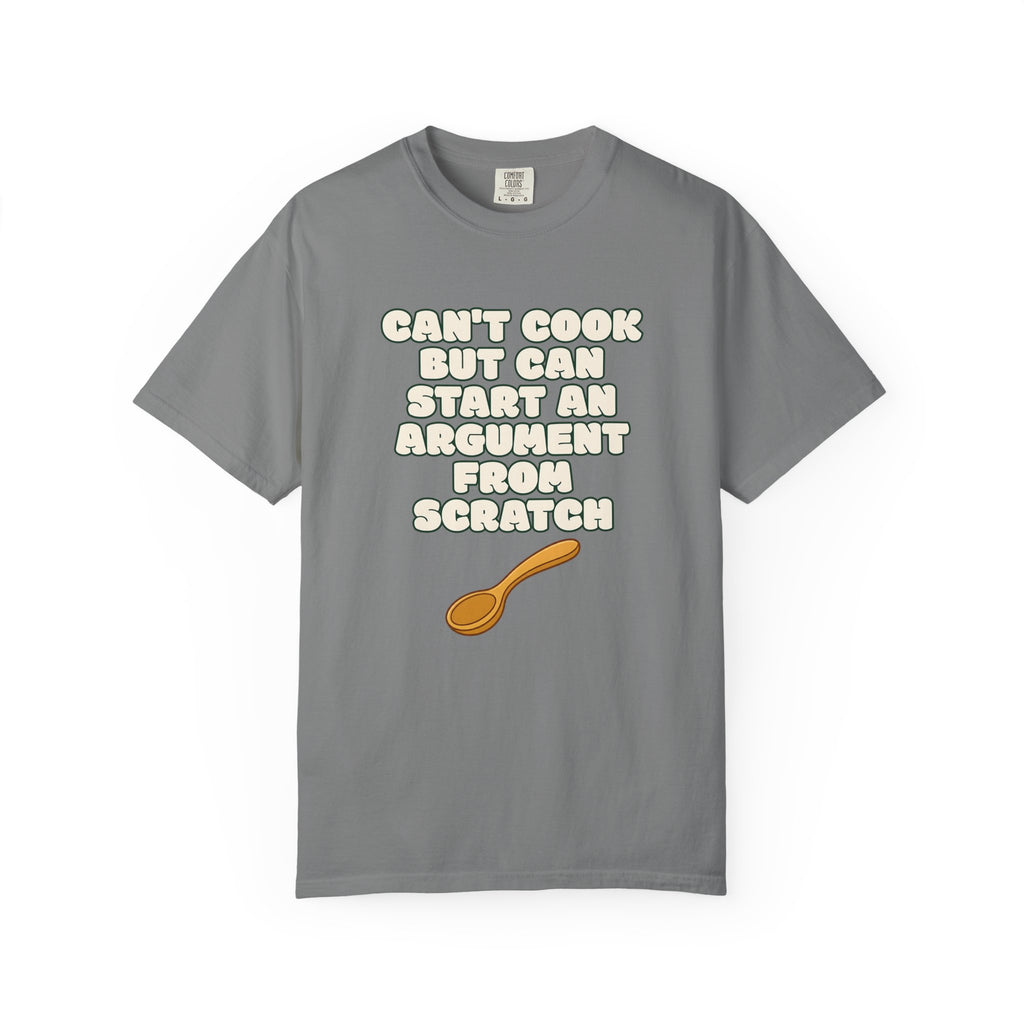 Flat lay of grey graphic t-shirt on white background featuring Can’t Cook slogan.