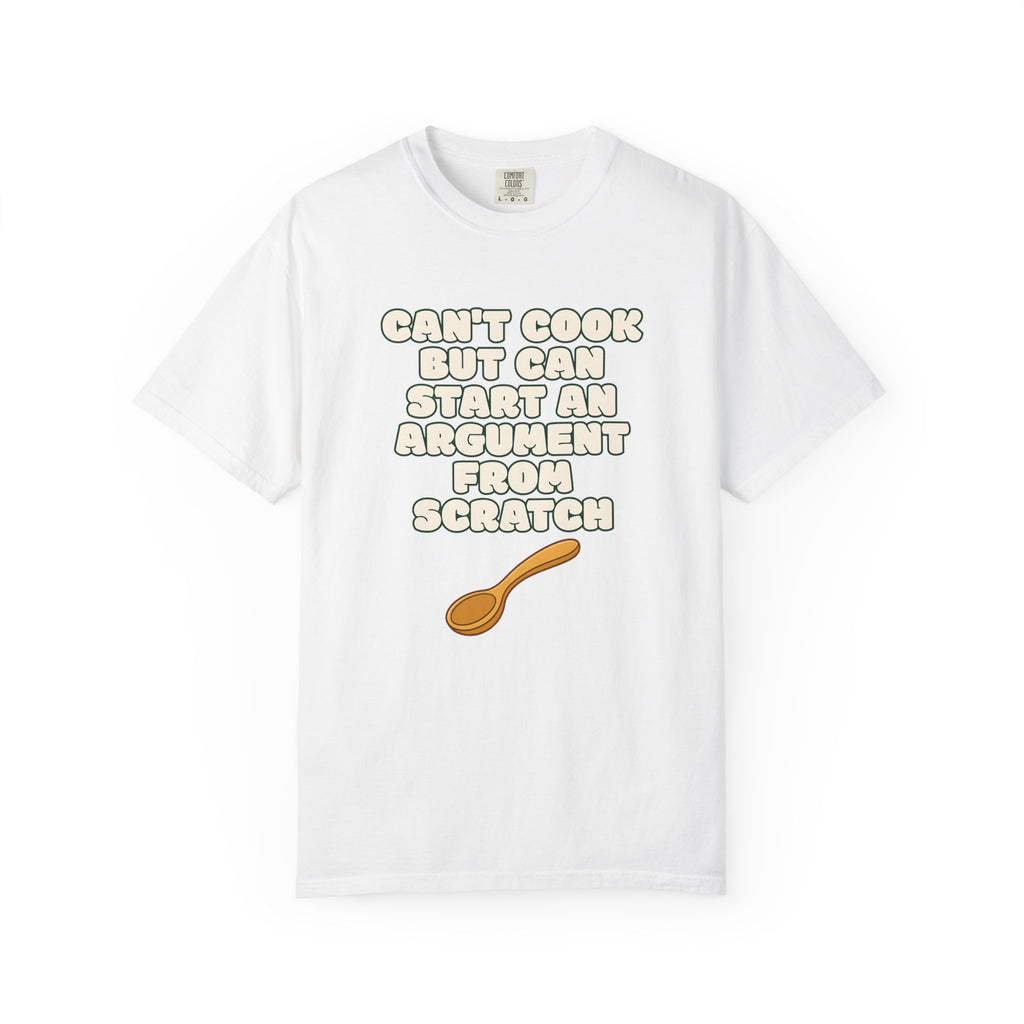 Flat lay of white graphic t-shirt on white background featuring Can’t Cook slogan.