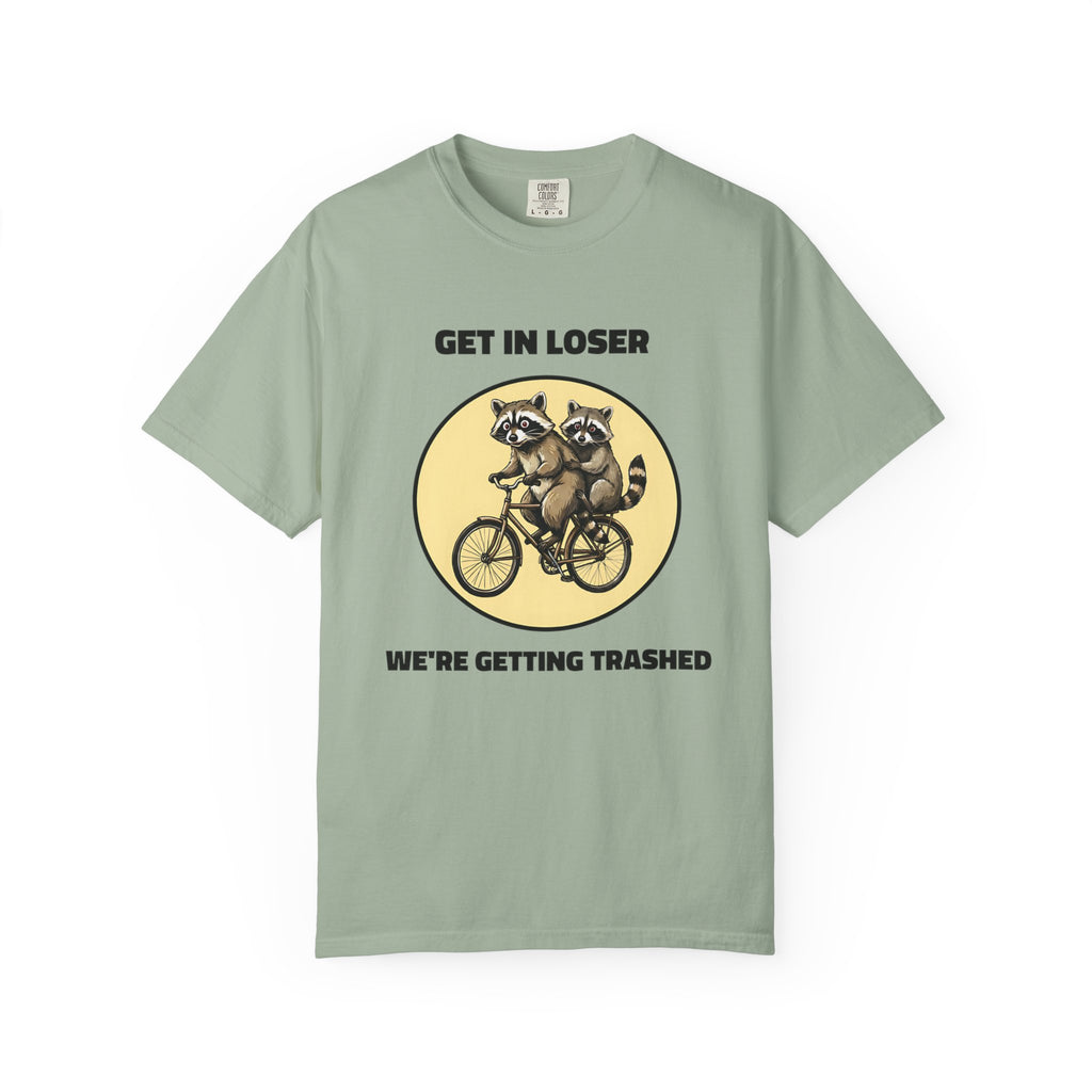 Flat lay of bay graphic t-shirt on white background featuring Get In Loser We’re Getting Trashed meme design.