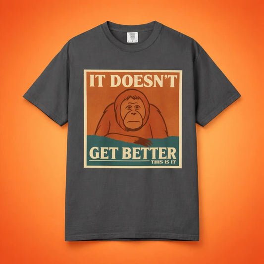 Dark grey t-shirt featuring a retro poster of a sad orangutan with text 'It Doesn't Get Better