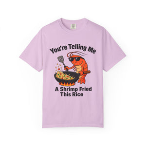 Flat lay of orchid graphic t-shirt on white background featuring shrimp fried rice design.