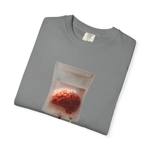 A folded grey t-shirt with a centered graphic of a brain suspended in an IV drip bag