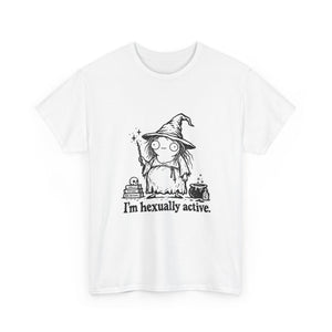 A white short-sleeve crewneck t-shirt featuring a black line art graphic of a cute wizard character with the text 'I'm sexually active.' printed below.