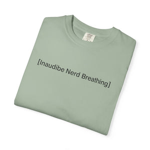 Folded sage green T-shirt with the text [Inaudible Nerd Breathing] printed in the center