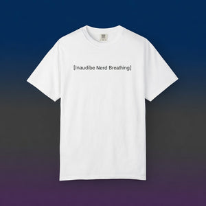A flat-lay view of a white T-shirt with the [Inaudible Nerd Breathing] graphic, set against a dark blue to grey gradient background