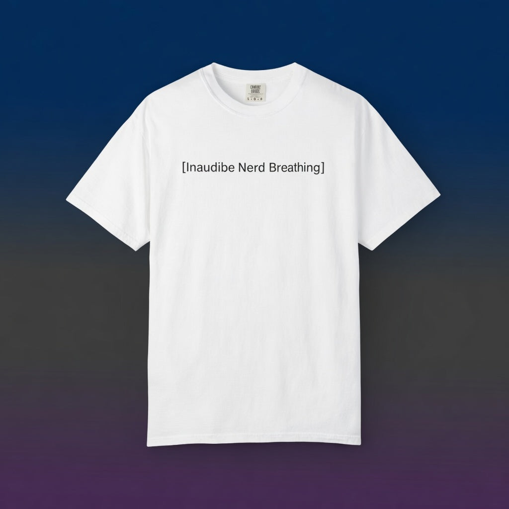 A flat-lay view of a white T-shirt with the [Inaudible Nerd Breathing] graphic, set against a dark blue to grey gradient background