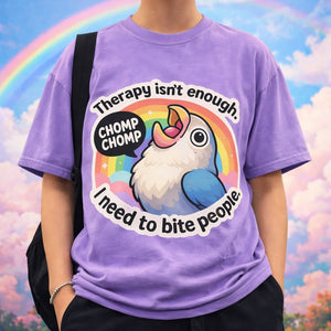 Person wearing an oversized purple t-shirt with a funny screaming bird design against a cloudy rainbow background.