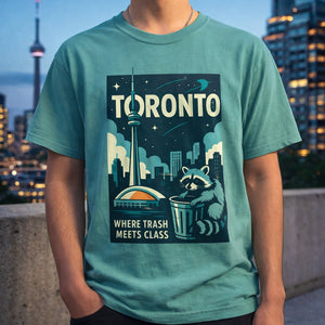 Male model standing on a rooftop at dusk wearing the Toronto Where Trash Meets Class t-shirt with the actual city skyline in the background.