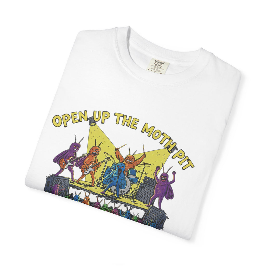 A crisp white Comfort Colors t-shirt neatly folded on a white surface, prominently featuring the colorful "Open Up The Moth Pit" heavy metal moth meme design.