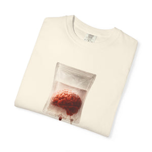 A folded off-white t-shirt with a centered graphic of a brain suspended in an IV bag