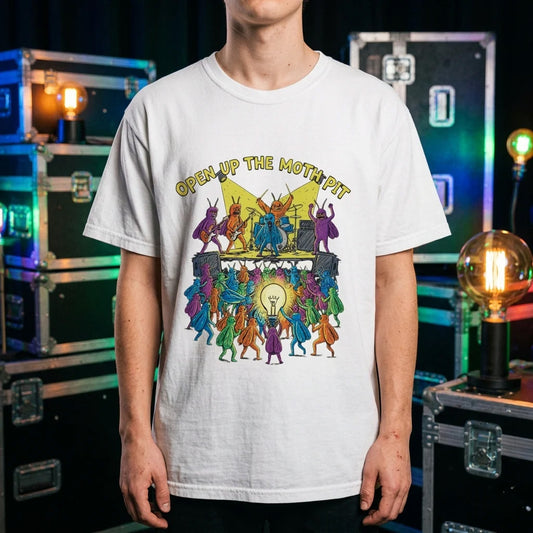 A white Comfort Colors t-shirt featuring the "Open Up The Moth Pit" graphic, centered against a vibrant solid blue background with a soft drop shadow.