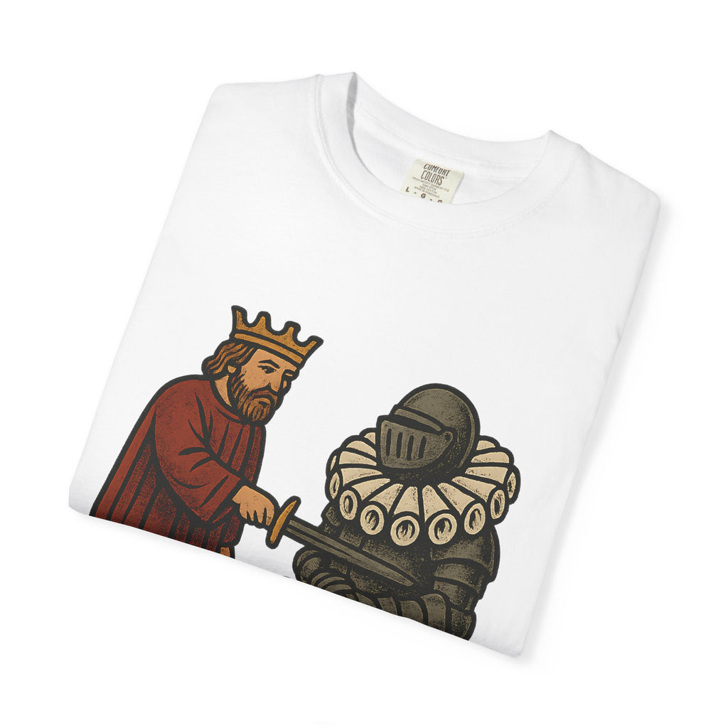Folded white t-shirt showing the Sir Cumcision woodcut illustration style graphic.