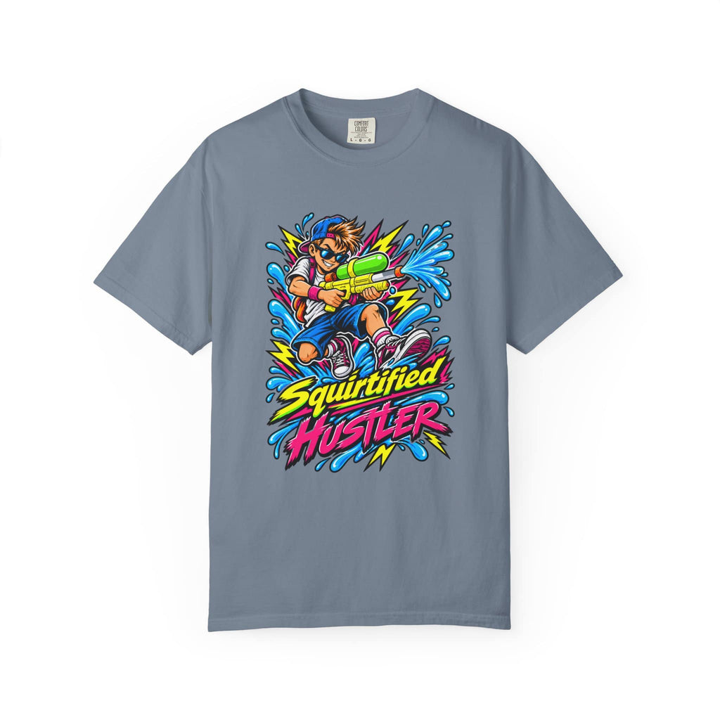 A slate blue crewneck t-shirt featuring a colorful graphic of a cartoon character holding a water gun, surrounded by blue water splashes and the text 'Squirtified HUSTLER' in yellow and pink.
