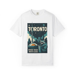 White graphic t-shirt showing a raccoon sitting in a blue garbage bin in front of the CN Tower.
