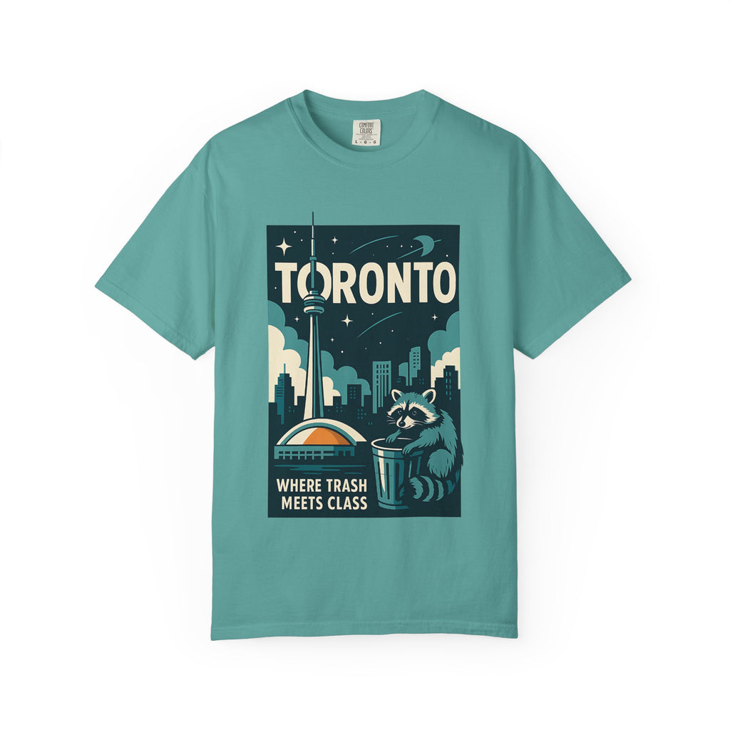 Teal green t-shirt with a graphic of a raccoon and the text Where Trash Meets Class.
