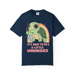Navy Blue t-shirt showing full front graphic of a turtle with a knife and "Unhinged" text.
