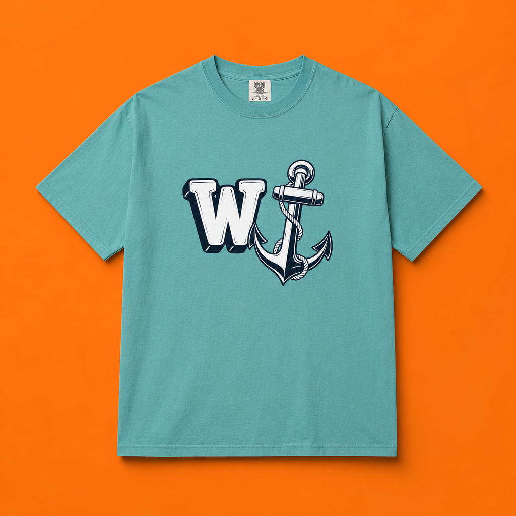 Flat lay product mockup of a seafoam green t-shirt centered against a vibrant orange background, featuring the W Anchor graphic on the front.