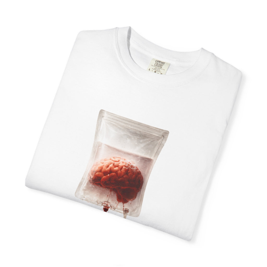 A neatly folded white t-shirt featuring a graphic of a brain inside an IV drip bag on the front