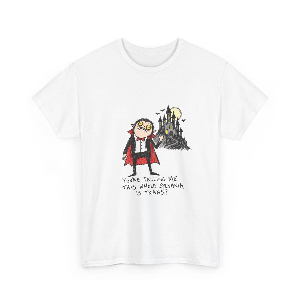 A white short-sleeve crewneck t-shirt featuring a cartoon graphic of a trans vampire character standing in front of a haunted castle under a full moon, with the text 'YOURE TELLING ME THIS WHERE SEWANA IS TRANS?' printed below.
